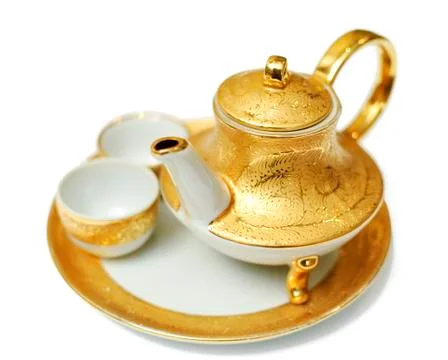 Gold teapot Stock Photos