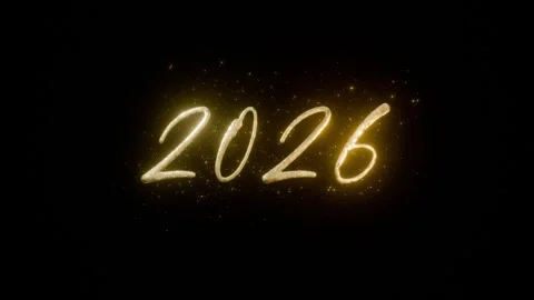 The gold text 2026 appears with particles on a black background Stock Footage 324846385