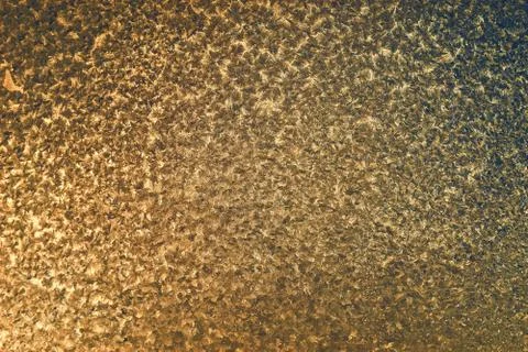 Gold texture background.  patterns on the metal surface Stockfoto's
