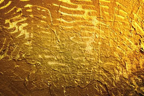 Gold texture. Structure wall. Golden Ore rocks. Stone background. Abstract te Stock Photos