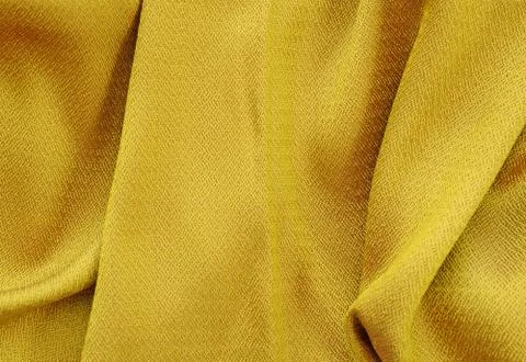 Gold thread on the fabric Stock Photos