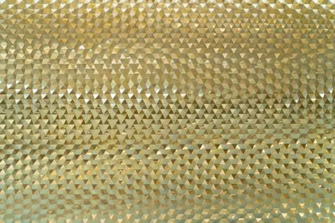 Gold triangle tiles texture, pattern graphic background. Stock Photos