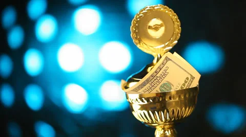 Gold trophy with money Stock Footage 35575182