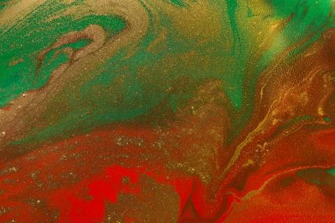 Gold waves on flow red and green paints abstract background. Stock Illustration