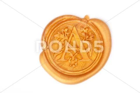 Gold wax seal isolated on white Stock Photos