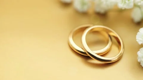 Gold wedding background with rings Stock Footage 221440949