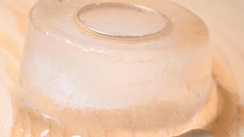 Gold wedding ring on a block of ice. Keep cool. Video stock 115445065