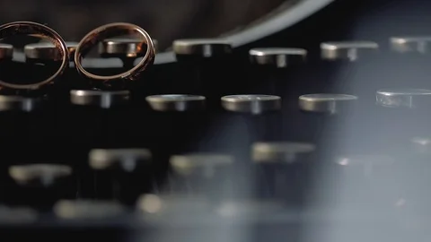 Gold Wedding Rings macro closeup lensflare shoot diamon Jewellery Stock Footage 114486865