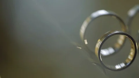 Gold Wedding Rings macro closeup lensflare shoot diamon Jewellery Stock Footage 114494322