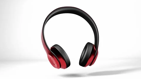 Gold wireless headphones on white background Stock Footage 282869716