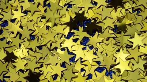 Gold yellow confetti shines at different angles, shake, throw off fallen stars Stock Footage 125210366