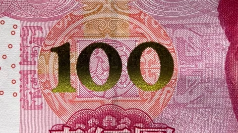 Golden 100 on Pink Banknote Texture Stock Footage 258395796