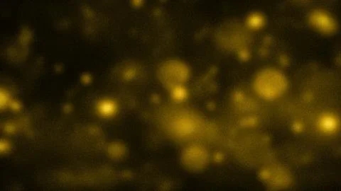 Golden abstract background with a grainy texture and soft glowing bokeh lig.. 스톡 일러스트