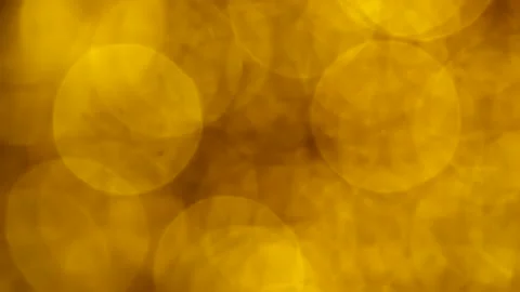 Golden abstract defocused background, circle shape bokeh spots. Stock Footage 259949016