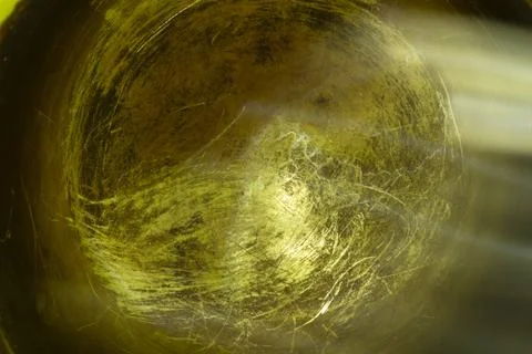 Golden abstract sphere with light rays on black background artistic texture Stock Photos
