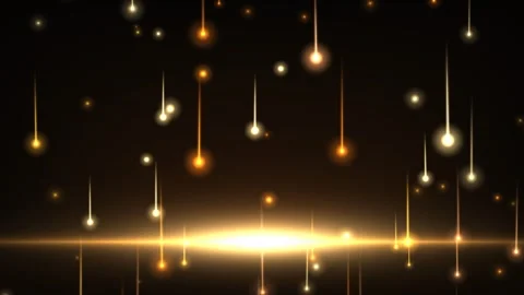 Golden amber light particles falling like stars on black background. 4K 스톡 동영상 345111748