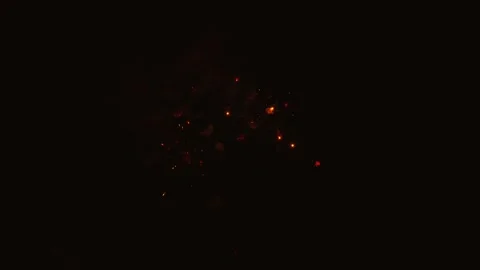Golden and orange fireworks exploding at night Video stock 343160334