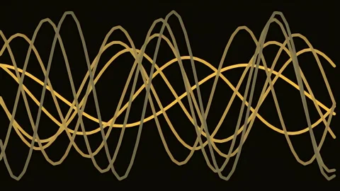 Golden Audio Waveform Lines Oscillating on Dark Background Stock Footage 343588984