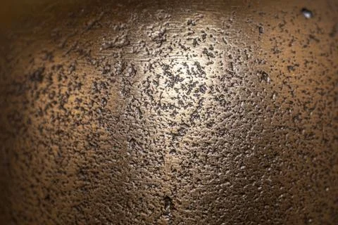 Golden background of an authentic image of an object, zoom on its texture f.. Stock Photos
