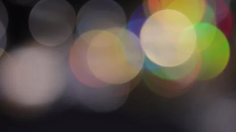 Golden background covered with large rainbow bokeh Видео 318073919