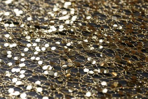 Golden background with glitters Stock Photos