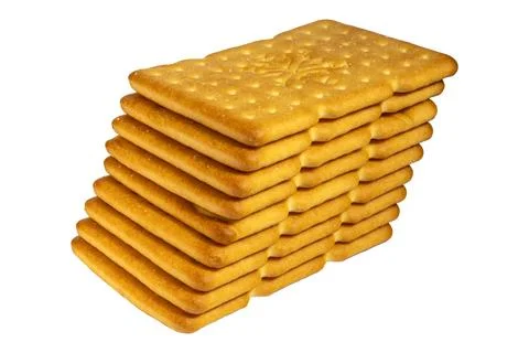 Golden baked rectangular crackers with perforated texture on white background Stock Photos