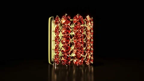 Golden bangle with red ruby gem stones rotate, isolated, fictitious Stock Footage 194813273
