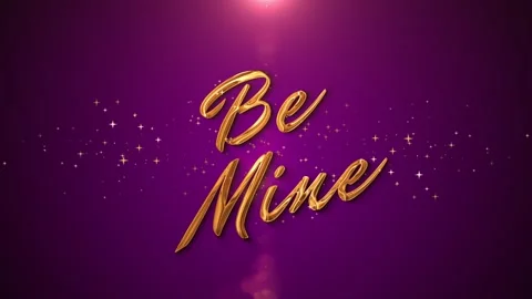 Golden “Be Mine” text animation with sparkling particles Stock Footage 317499653