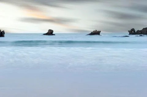 Golden beach at sunset Ris, Noja, Cantabria, Spain Stock Photos