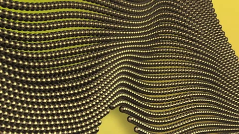 Golden Beads Flow and Break on Green Background Video stock 309844142