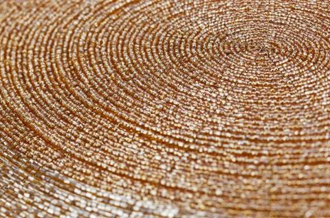 Golden beadwork texture background with round lines pattern Stock Photos
