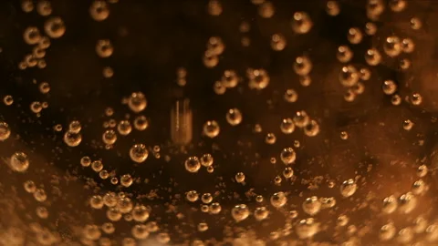 Golden beer bubbles come up Stock Footage 87670491