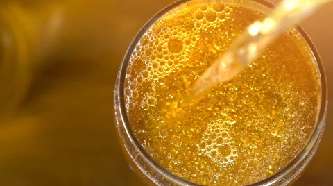 Golden beer iwith bubblrs Stock Footage 62516120