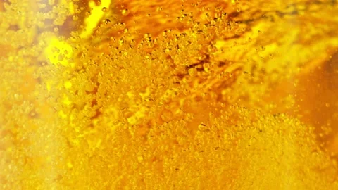 Golden Beer or Cider Vortex Stock Footage 204903715