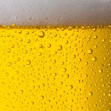Golden beer texture background Photos
