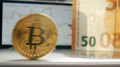 Golden bitcoin BTC fluttering on the background of a graphic stock chart Stock Footage 88715853