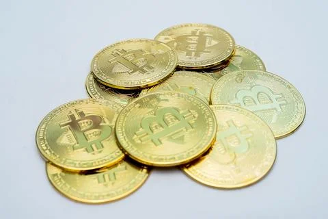 Golden bitcoin coins - virtual money of the world Stock Photos