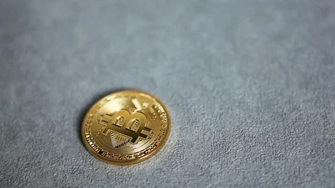 Golden Bitcoin on gray background, cryptocurrency concept Stock Footage 83794625