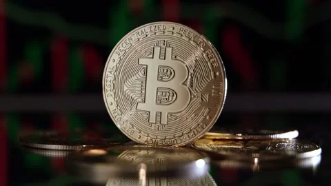 Golden bitcoin isolated on background with crypto chart with green and red Stock Footage 273290978