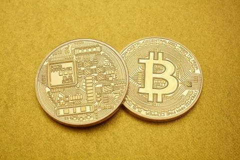 Golden bitcoin Stock Photos