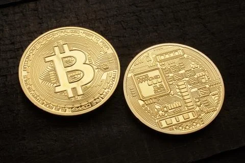 Golden bitcoin Stock Photos