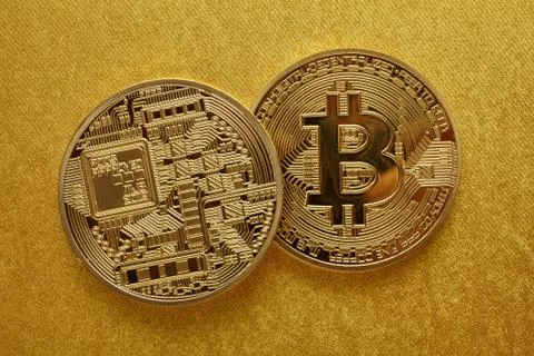 Golden bitcoin Stock Photos