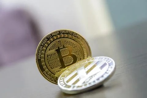 Golden bitcoin on Stock Photos