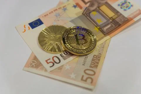 Golden bitcoin on Stock Photos