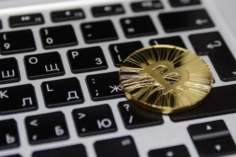 Golden bitcoin on Stock Photos