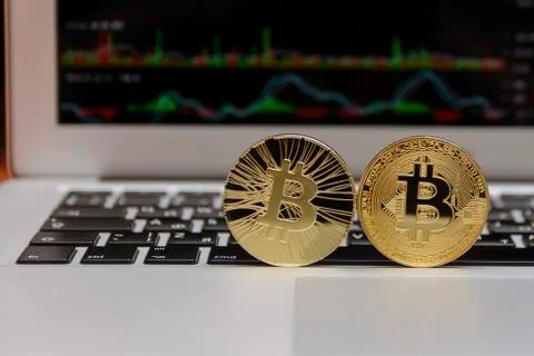 Golden bitcoin on Stock Photos