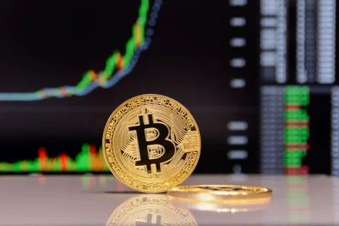 Golden bitcoin on Stock Photos