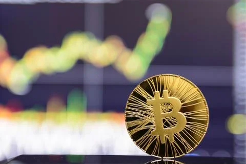 Golden bitcoin on Stock Photos