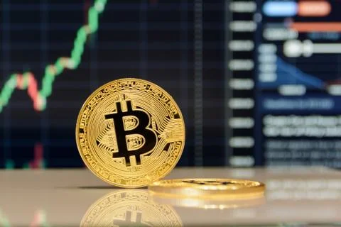 Golden bitcoin on Stock Photos