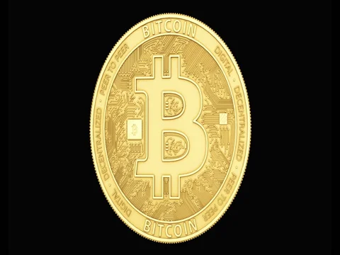Golden Bitcoin spinning in perfect loop isolated on black background. 4K 스톡 동영상 82714759